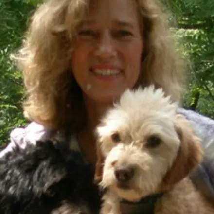 Dr. Penny Dowden with 2 dogs